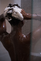 Image showing African American woman in the shower