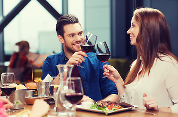 Image showing couple dining and drinking wine at restaurant