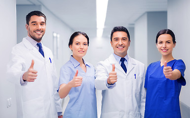 Image showing medics or doctors at hospital showing thumbs up