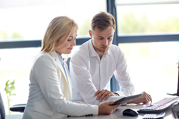 Image showing business team with tablet pc computer at office