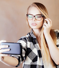 Image showing young happy smiling hipster blond girl with backpack ready to school, teenage lifestyle people concept