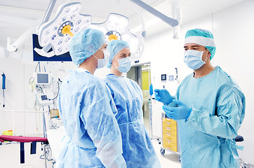 Image showing group of surgeons in operating room at hospital