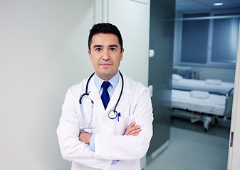Image showing doctor with stethoscope at hospital corridor