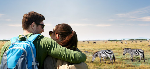 Image showing happy couple with backpacks traveling