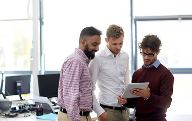 Image showing business team with tablet pc at office