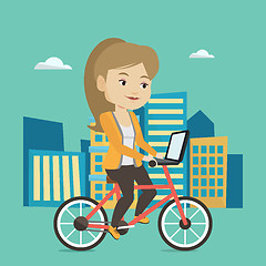 Image showing Woman riding bicycle in the city.