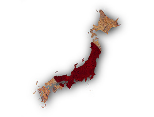 Image showing Map and flag of Japan on rusty metal