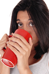 Image showing Beautiful Hispanic woman with red mug.