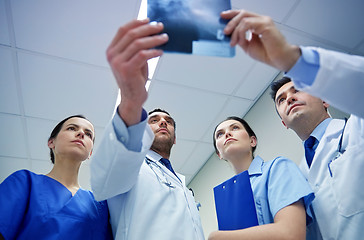 Image showing group of doctors looking at x-ray scan image