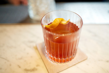 Image showing glass of alcohol cocktail on bar counter