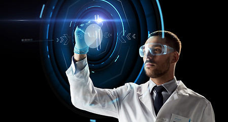 Image showing scientist with test tube and virtual projection