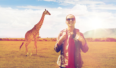 Image showing happy woman with backpack traveling in africa