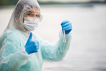 Image showing Photo of ecologist in mask