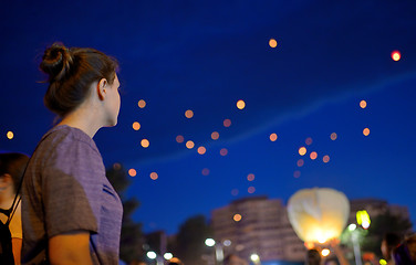 Image showing Teen Girl  watching paper lantern