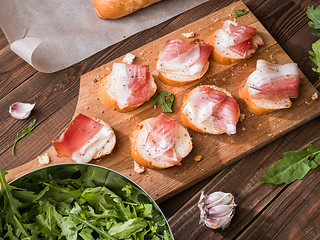 Image showing Table with sandwiches and bacon