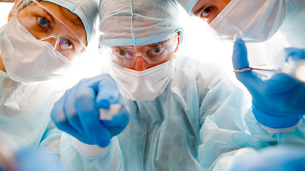 Image showing Team of surgeon in uniform