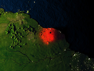 Image showing Suriname in red from space at night