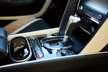 Image showing Detail of modern car interior, gear stick.