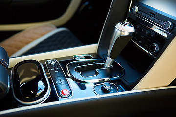 Image showing Detail of modern car interior, gear stick.