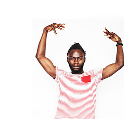 Image showing young handsome afro american boy stylish hipster gesturing emotional isolated on white background smiling, people lifestyle concept