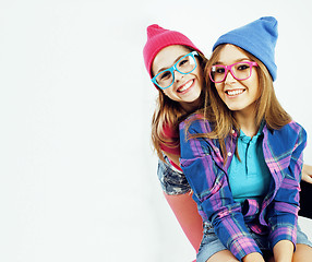 Image showing best friends teenage girls together having fun, posing emotional on white background, besties happy smiling, lifestyle people concept