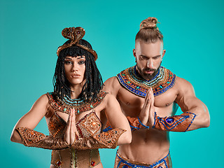 Image showing The man, woman in the images of Egyptian Pharaoh and Cleopatra