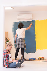 Image showing Happy couple doing home renovations