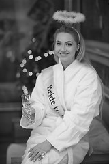 Image showing woman drinking champagne at spa