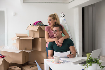 Image showing Young couple moving in a new home