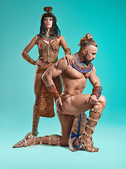 Image showing The man, woman in the images of Egyptian Pharaoh and Cleopatra