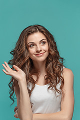 Image showing The young woman\'s portrait with happy emotions