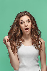 Image showing Portrait of young woman with shocked facial expression