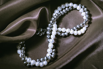Image showing Natural Pearl Necklaces On Silk Background
