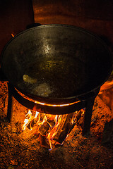 Image showing Cooking over a campfire