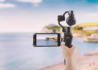 Image showing Smartphone shooting concept Isle of Wight coast Alum Bay next to