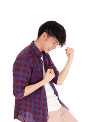 Image showing Happy Asian man in checkered shirt.