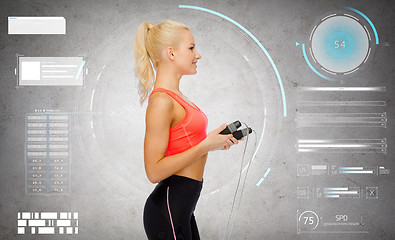 Image showing sporty woman with skipping rope