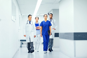 Image showing group of medics or doctors at hospital corridor