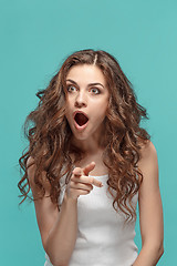 Image showing Portrait of young woman with shocked facial expression