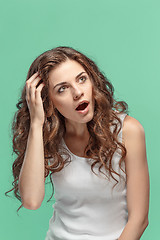 Image showing Portrait of young woman with shocked facial expression