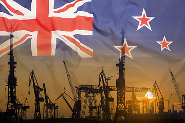 Image showing Industrial concept with New Zealand flag at sunset