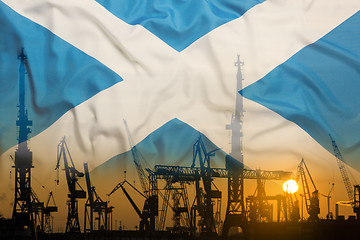 Image showing Industrial concept with Scotland flag at sunset