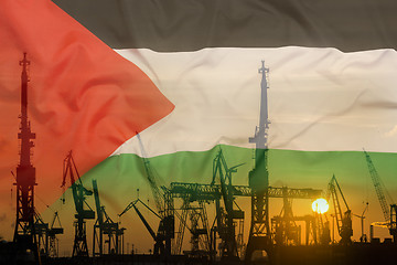 Image showing Industrial concept with Palestine flag at sunset