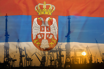 Image showing Industrial concept with Serbia flag at sunset