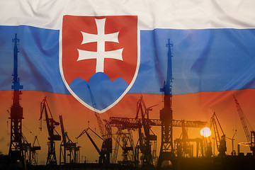 Image showing Industrial concept with Slovakia flag at sunset