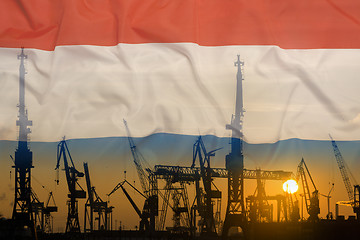 Image showing Industrial concept with Netherlands flag at sunset