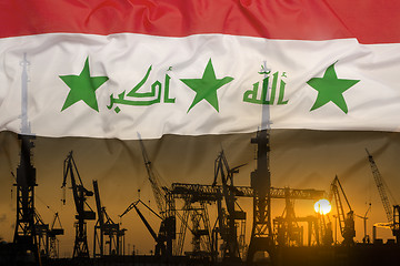 Image showing Industrial concept with Iraq flag at sunset