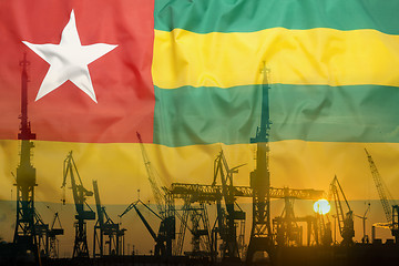 Image showing Industrial concept with Togo flag at sunset