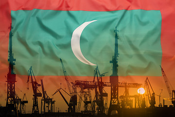 Image showing Industrial concept with Maldives flag at sunset