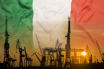 Image showing Industrial concept with Italy flag at sunset